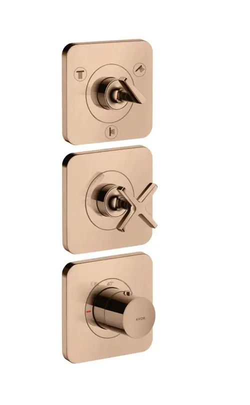 Thermostatmodul mit drei Steuerungselementen in Polished Red Gold. AXOR-Logo sichtbar. Gestaltung zur Wandmontage mit quadratischen Abdeckungen.